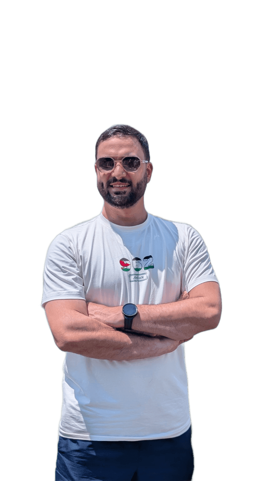 Mahmood Qudah standing with folded arms